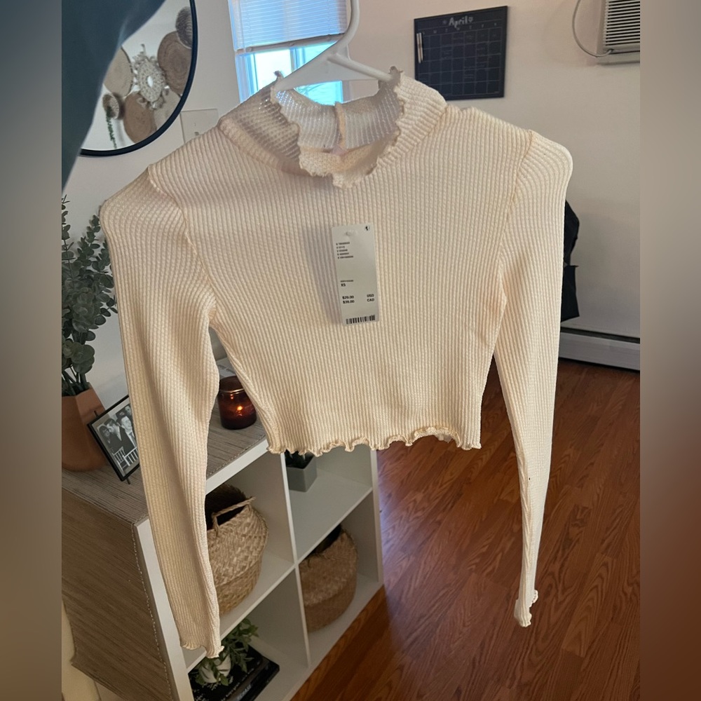 New Urban Outfitters cream mock neck long sleeve.